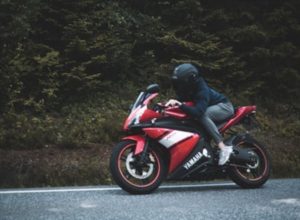 women riding motorcycle